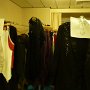 rack of costumes to be repaired and the ones that are repaired